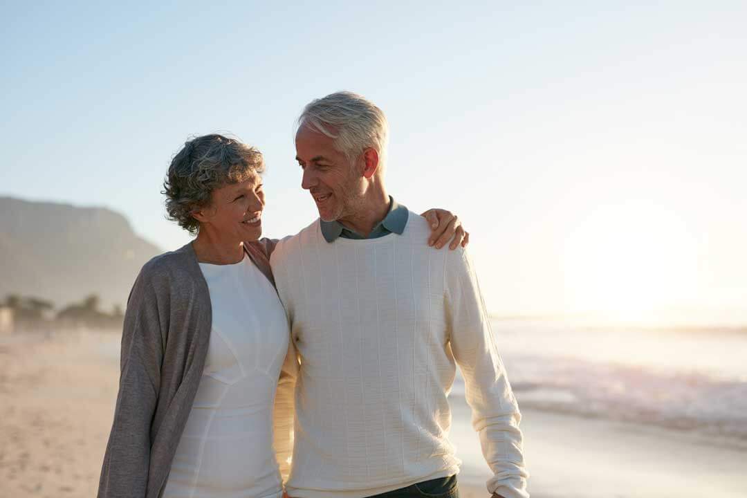 couple on beach; understanding Medicare supplements